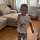 Child wearing the white Spider-Man graphic T-shirt